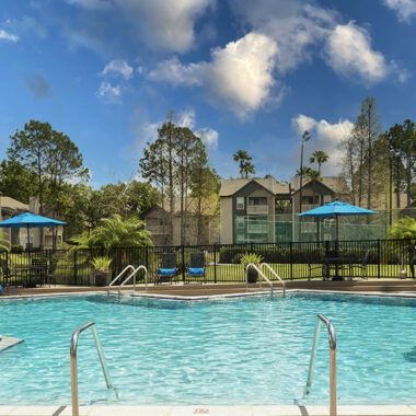Resort Pool with Sundeck and Gas Grills