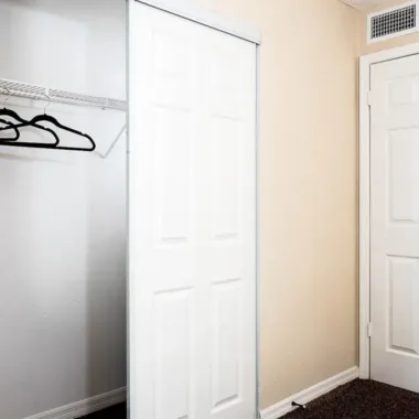 Bedroom closet storage at Willowbrooke Apartments in Lakeland, FL