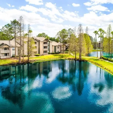 Willowbrooke apartment building beside a lake in Lakeland, FL