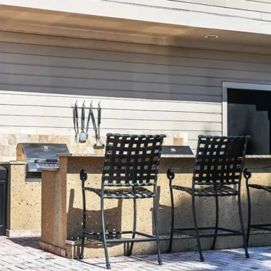 Poolside gas grilling area at Willowbrooke Apartments in Lakeland