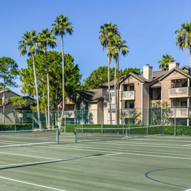 Two tennis courts at Willowbrooke Apartments in Lakeland, FL