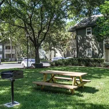 Landscaped BBQ and picnic areas at Willowbrooke Apartments in Lakeland